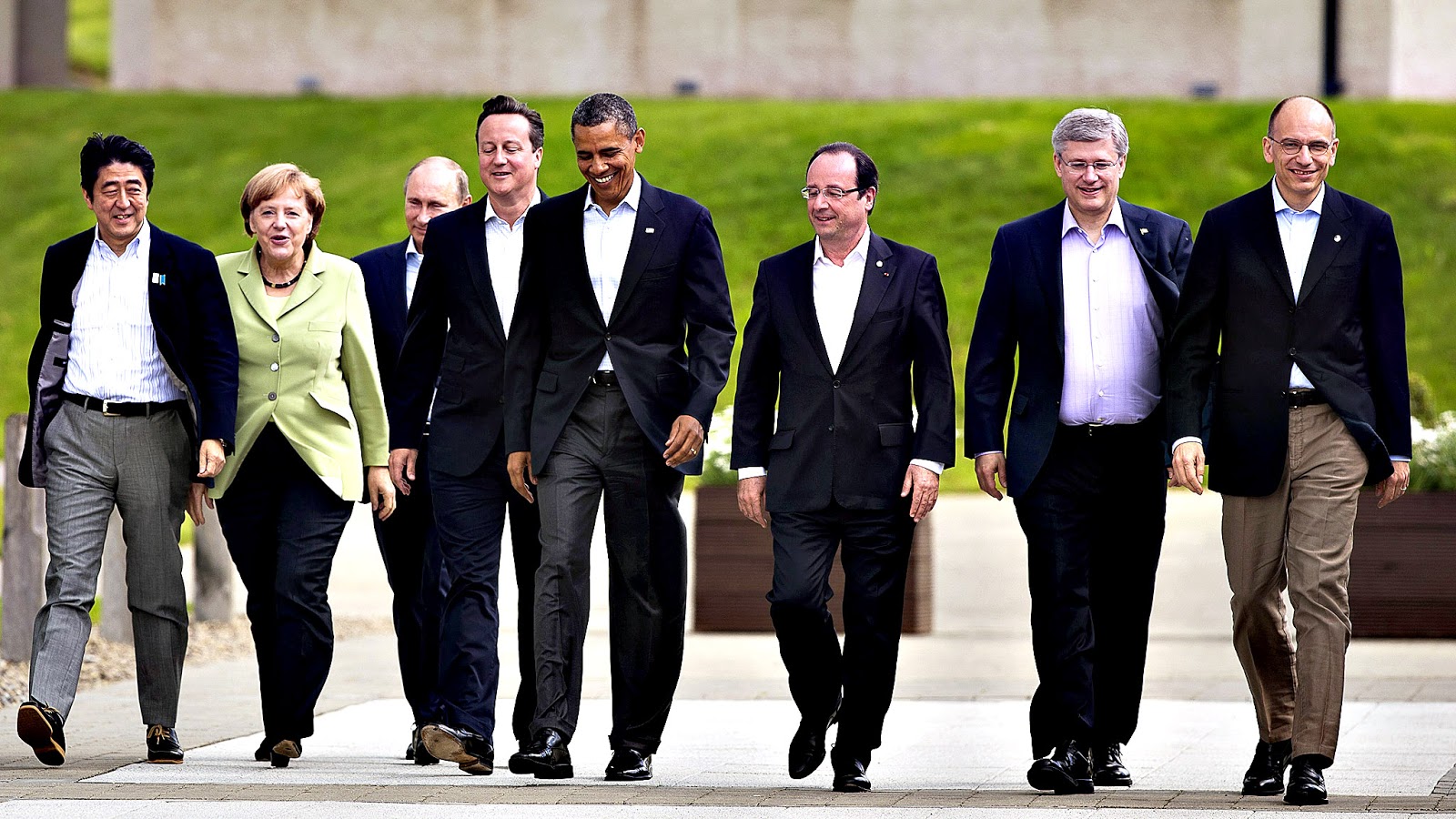 G8 Summit in Lough Erne...epa03749726 (L-R) Japanese Prime Minister Shinzo Abe, German Chancellor Angela Merkel, Russian President Vladimir Putin, British Prime Minister David Cameron, US President Barack Obama, French President Francois Hollande, Canadian Prime Minister Stephen Harper and Italian Prime Minister Enrico Letta arrive for a family photo on the second day of the G8 Summit at Lough Erne, Northern Ireland, Britain, 18 June 2013. Leaders from Canada, France, Germany, Italy, Japan, Russia, USA and UK are meeting at Lough Erne in Northern Ireland for the G8 Summit 17-18 June. The leaders were holding their second and final day of talks on 18 June, with the global economy and tax avoidance high on the agenda. EPA/KERIM OKTEN