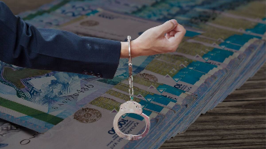 Қарағандылық кәсіпкерді қорқытып, 700 мың доллар талап еткен күдікті ұсталды